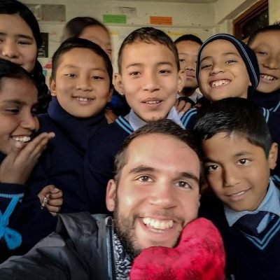 Volunteers teaching in a classroom in rural Nepal, providing education and a brighter future for the children in the community